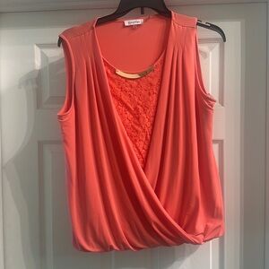 Sleeveless knit blouse with lace detail